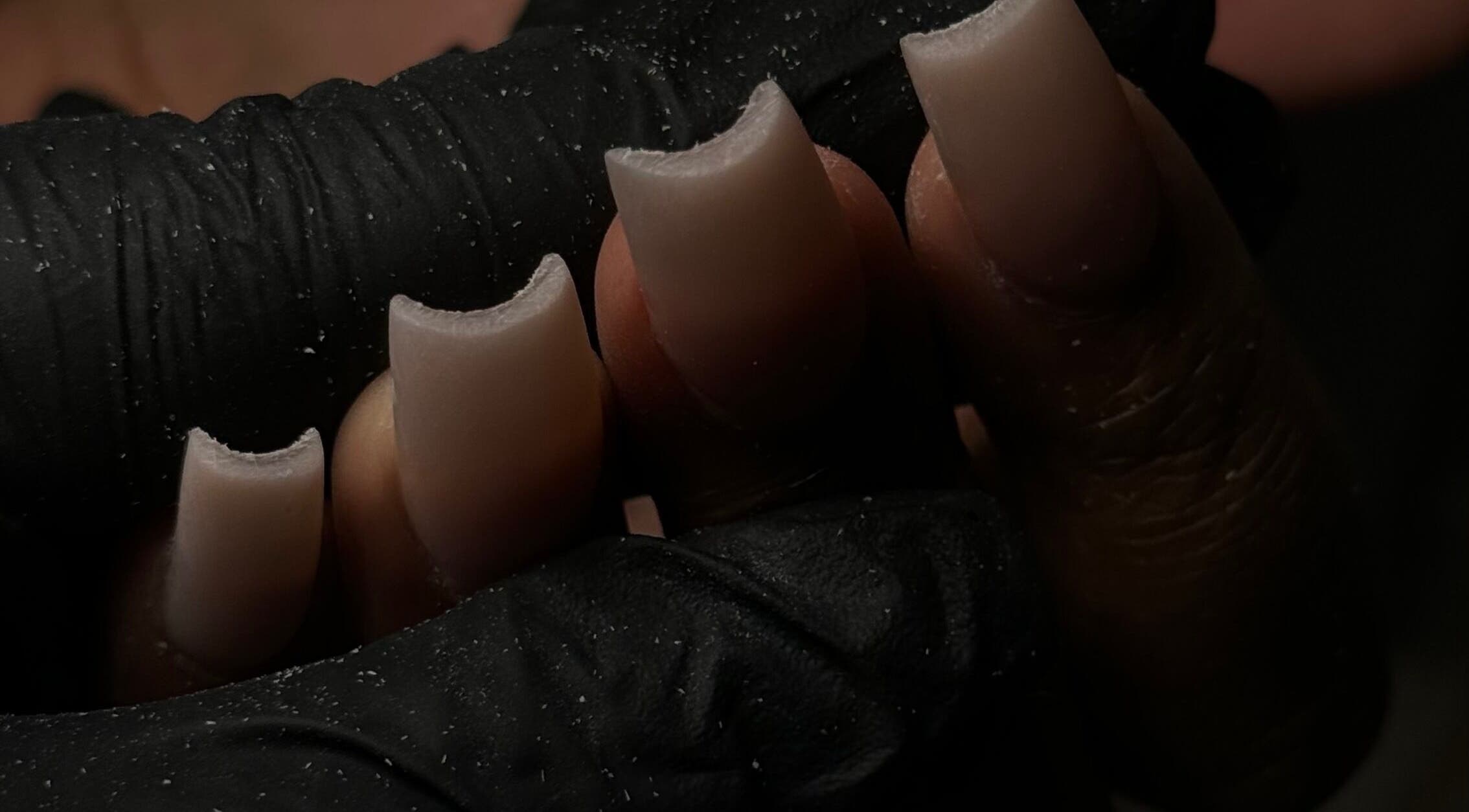 Close-up of manicured nails at Polished Beauty, Atlanta, Georgia, US, showcasing precision nail care.