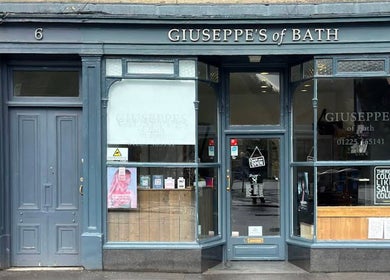 Front view of Giuseppe’s of Bath, a beauty venue located in Bath, England, GB with elegant window displays.