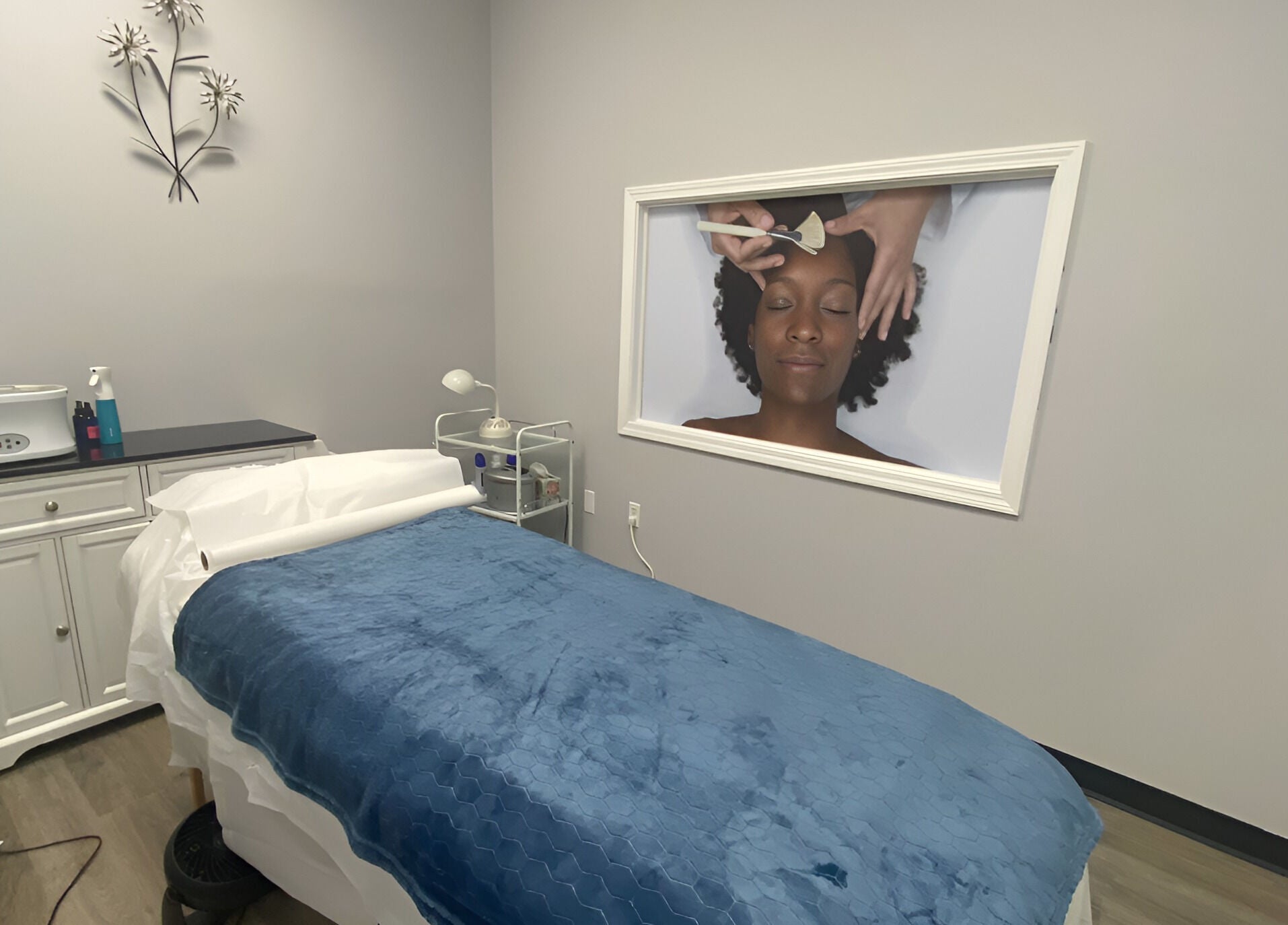 Cozy treatment room at Gorgeous Ever Center, Roswell, Georgia, US, with a comfortable spa bed and calming decor.