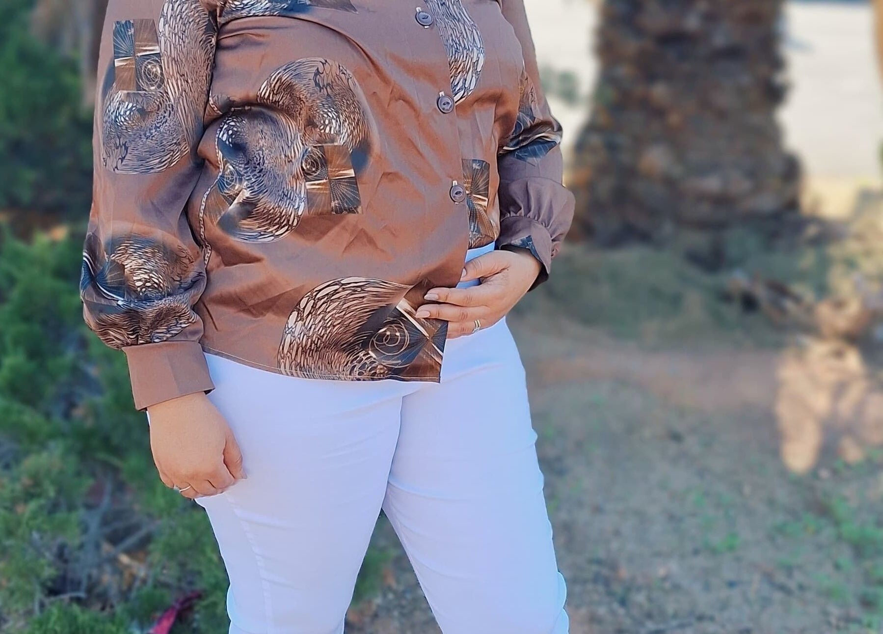 Person in elegant blouse visiting The Nail Bar 'By Miche', Worcester, Western Cape, ZA.