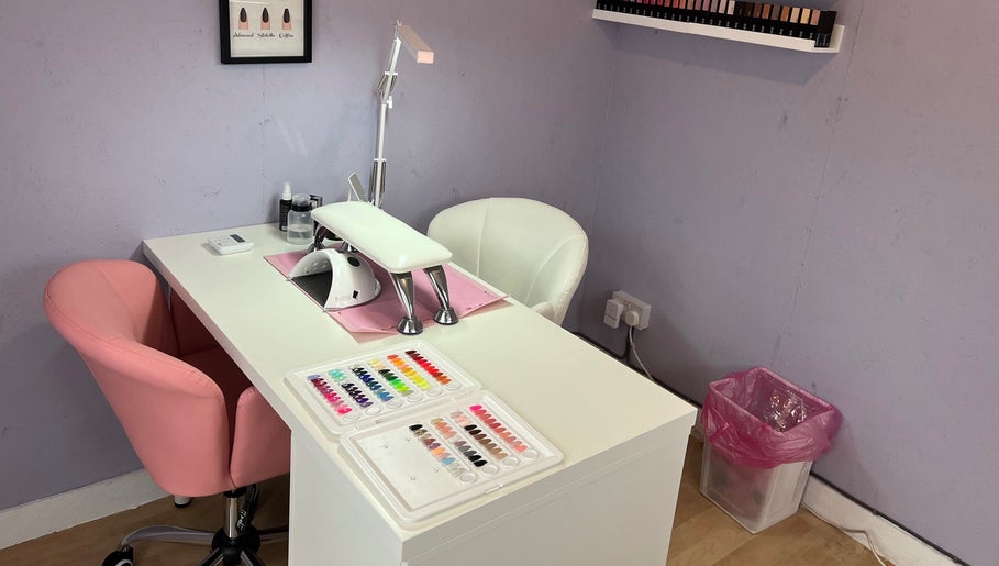 Stylish nail workstation at NextLevelNails, Northleach, England, GB offering vibrant polish choices.
