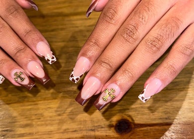 Elegant nail art with gold accents at AllurebeautybyC_ in Cape Town, Western Cape, ZA.
