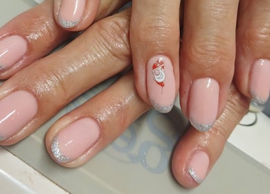 Elegant nail art with glitter tips at X Nails and Beauty, Ballito, Kwazulu-natal, ZA.