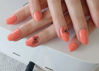 Elegant butterfly nail art at X Nails and Beauty, Ballito, Kwazulu-natal, ZA. Perfectly crafted manicure.