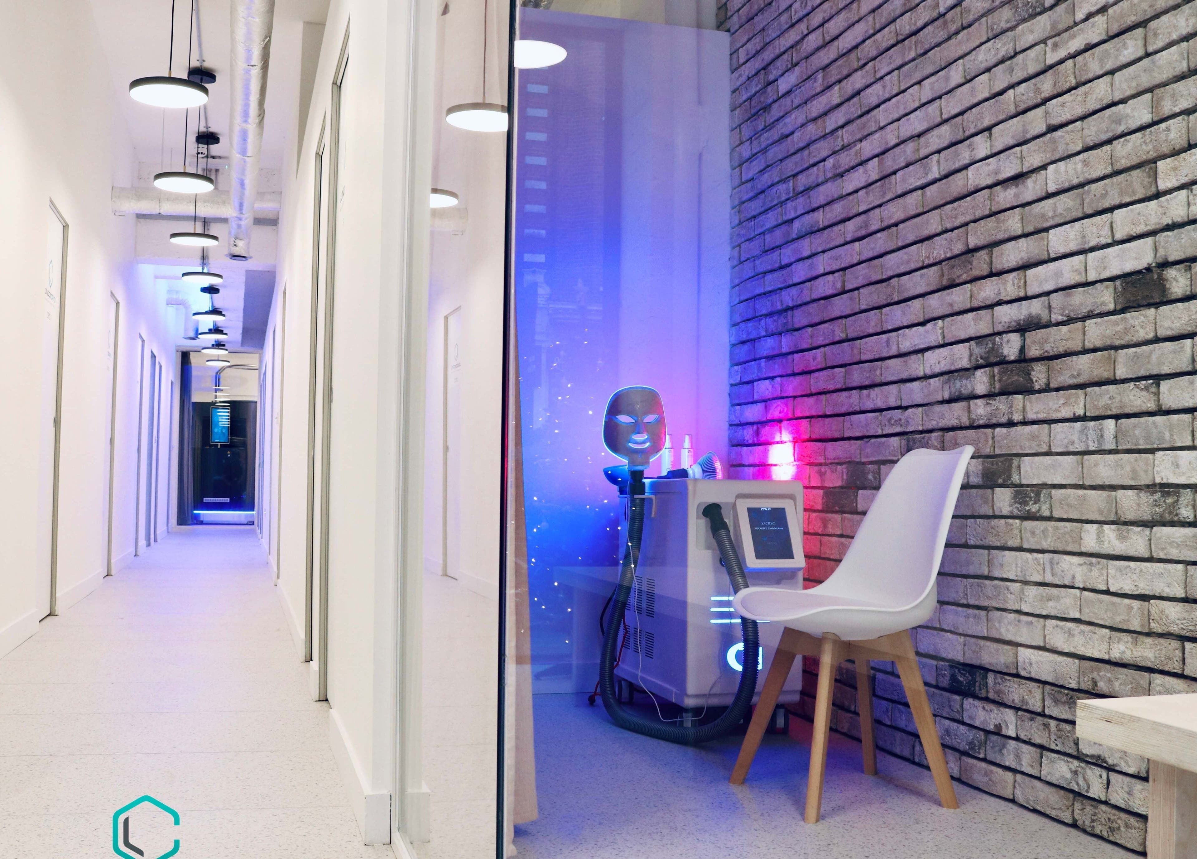 Sleek interior of LondonCryo St Johns Wood, London, England with cryotherapy equipment and modern decor.