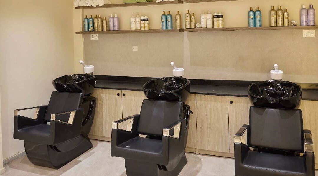 Modern wash stations at CBK Beauty Flagship Salon, Accra, Greater Accra Region, GH offer a luxurious hair care experience.