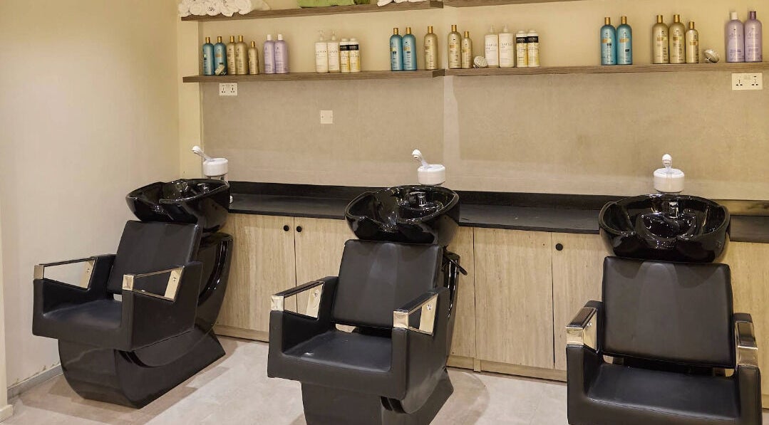 Modern wash stations at CBK Beauty Flagship Salon, Accra, Greater Accra Region, GH offer a luxurious hair care experience.