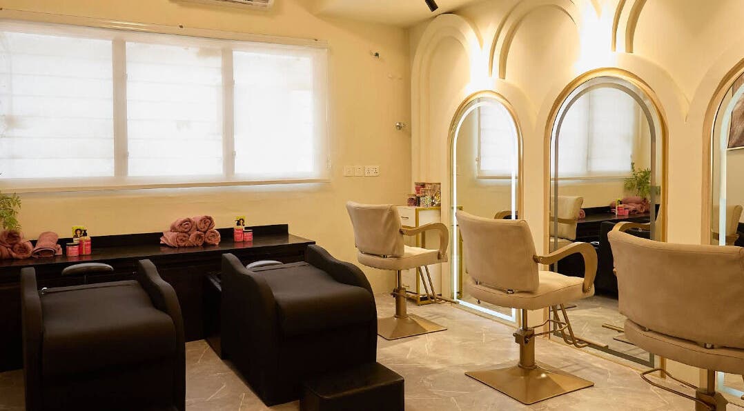 Interior of CBK Beauty Flagship Salon in Accra, Greater Accra Region, GH with styling chairs and mirrors.