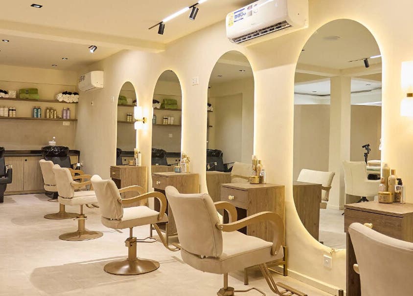 CBK Beauty Flagship Salon interior with cozy chairs and mirrors in Accra, Greater Accra Region, GH.