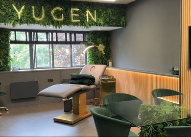 Interior of Yugen Skin Clinic in Sandbach, England, GB with elegant decor and treatment bed.