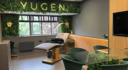 Interior of Yugen Skin Clinic in Sandbach, England, GB with elegant decor and treatment bed.