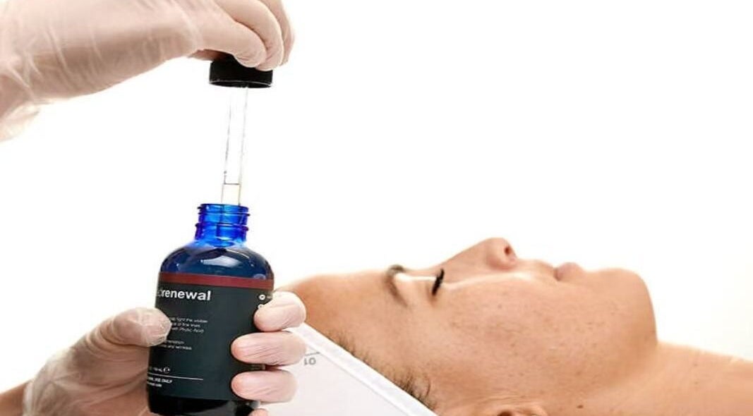 Facial treatment at Beauty and the Spa, Oakville, Ontario, CA showcases a rejuvenating serum application.