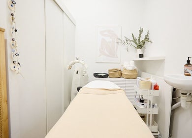 Elegant spa room at Parlour Box, North Bondi, New South Wales, AU with treatment table and soothing decor.