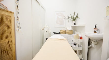 Elegant spa room at Parlour Box, North Bondi, New South Wales, AU with treatment table and soothing decor.