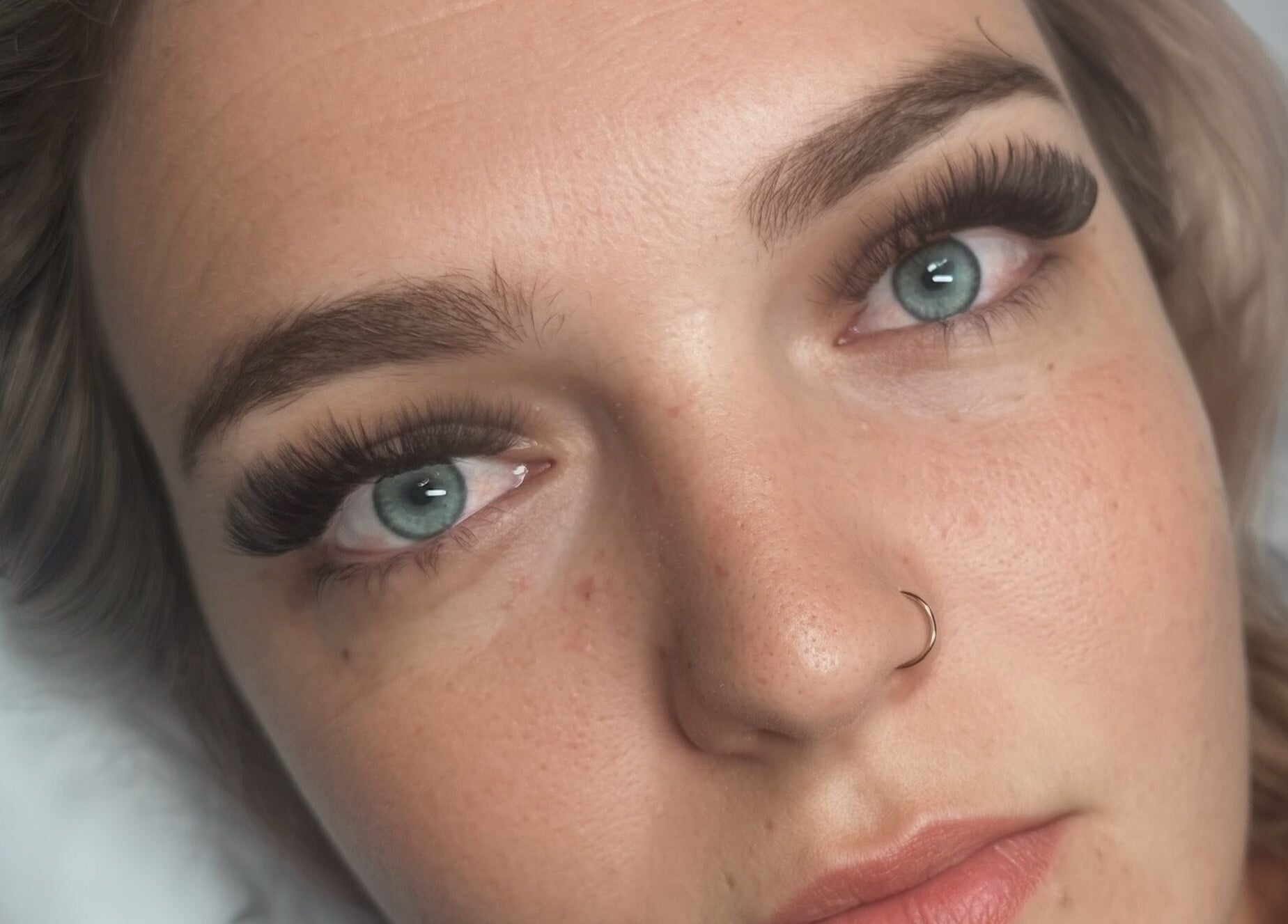 Close-up of voluminous lashes at Lash’d by Chan, Gorokan, New South Wales, AU. Beautifully crafted look.