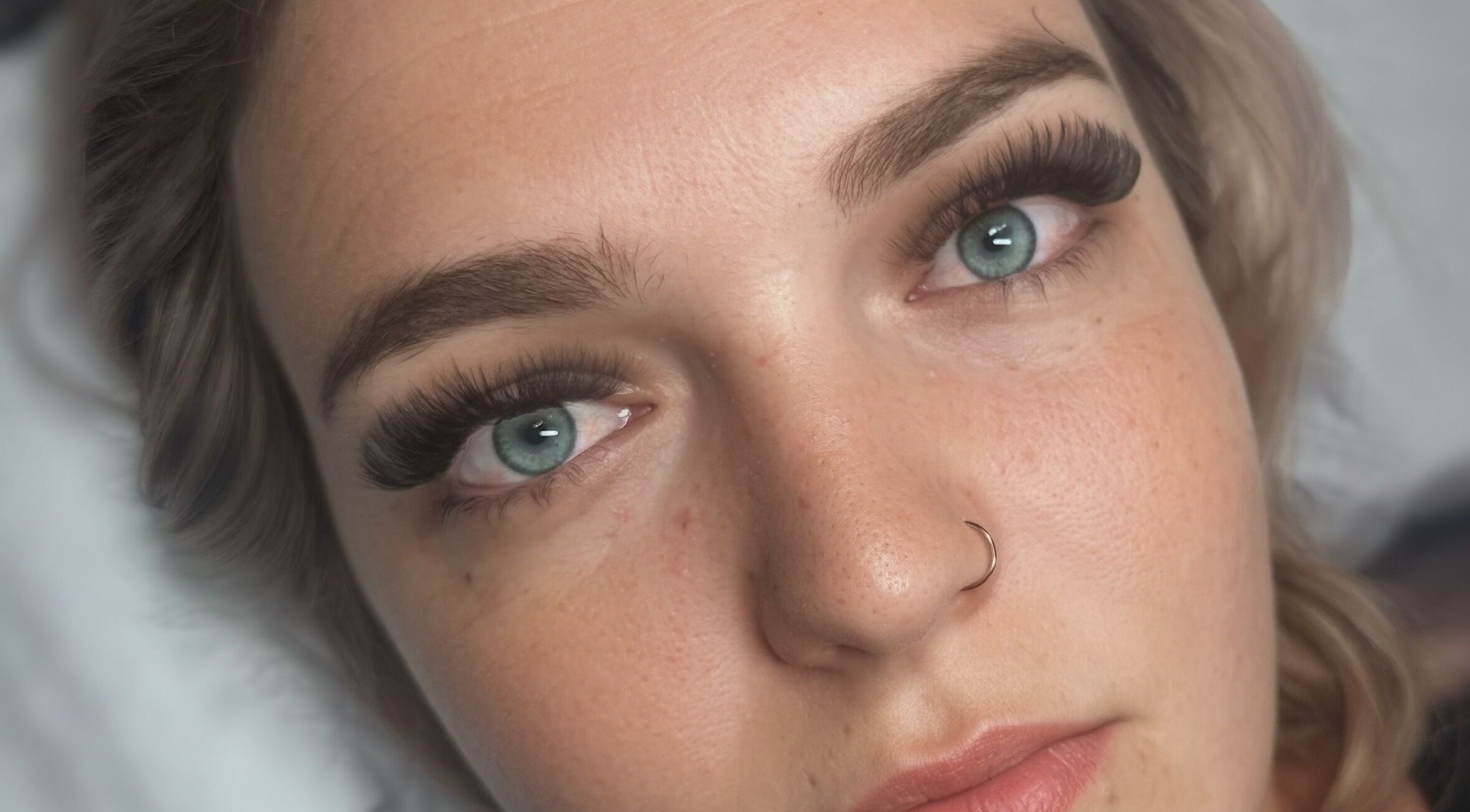 Close-up of voluminous lashes at Lash’d by Chan, Gorokan, New South Wales, AU. Beautifully crafted look.