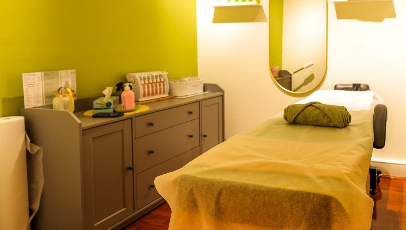Calming spa room at Kamkhya Beauty, Subiaco, Western Australia, AU showcasing a massage table and soothing decor.