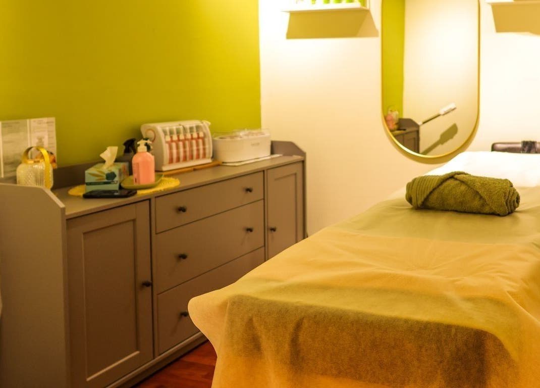 Calming spa room at Kamkhya Beauty, Subiaco, Western Australia, AU showcasing a massage table and soothing decor.