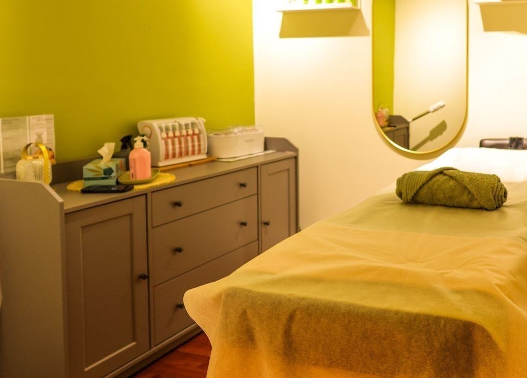 Calming spa room at Kamkhya Beauty, Subiaco, Western Australia, AU showcasing a massage table and soothing decor.