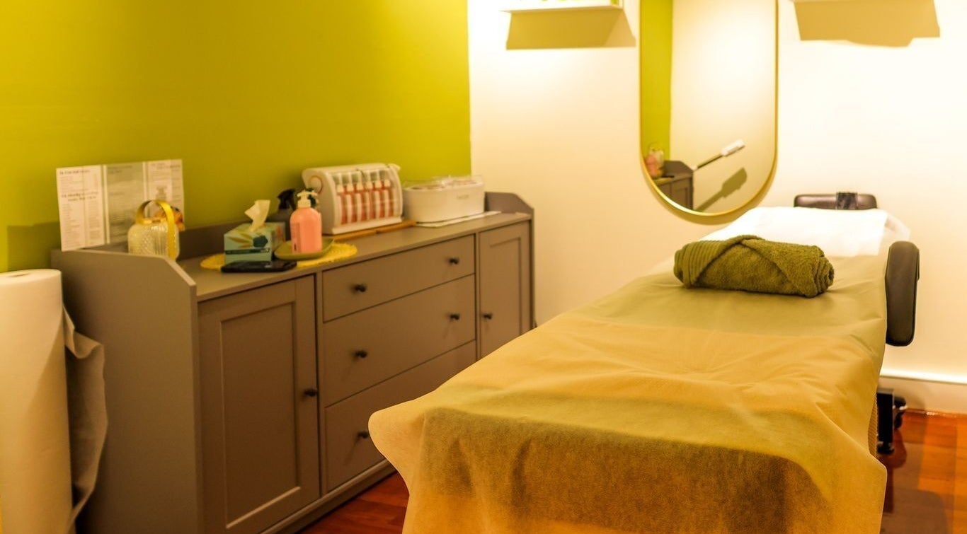 Calming spa room at Kamkhya Beauty, Subiaco, Western Australia, AU showcasing a massage table and soothing decor.