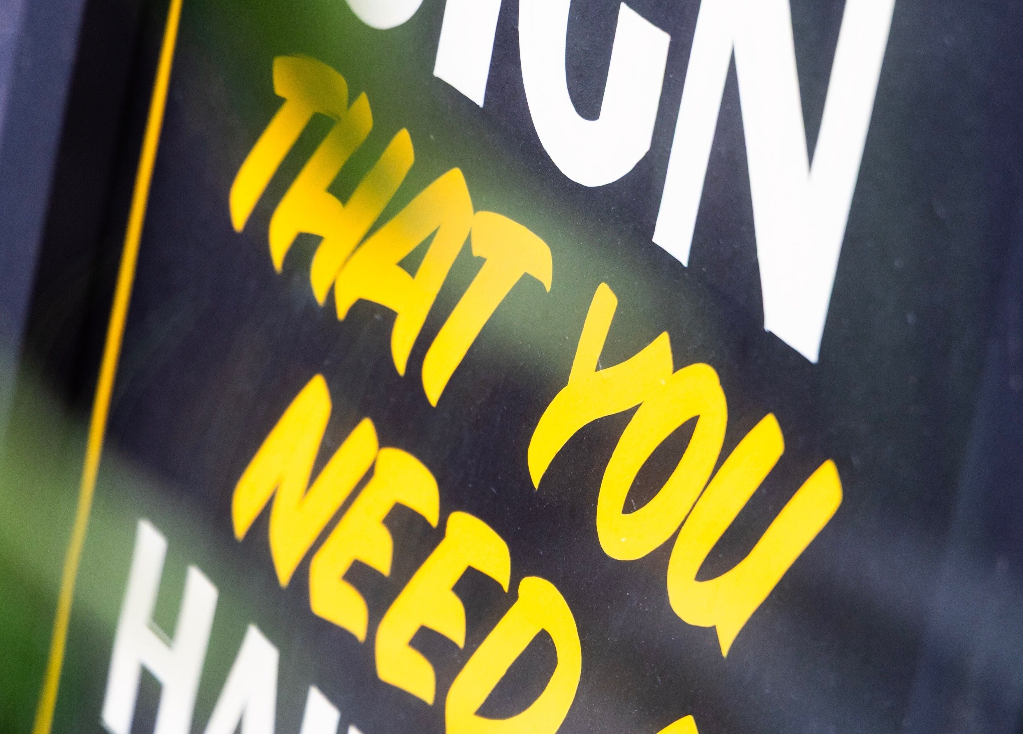 Bright, bold lettering sign at BeardyBeardyFinnieston, Glasgow, Scotland, GB, highlighting wellness focus.