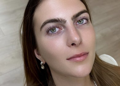 Close-up of a woman's radiant complexion at JL Beauty World, Toronto, Ontario, CA.