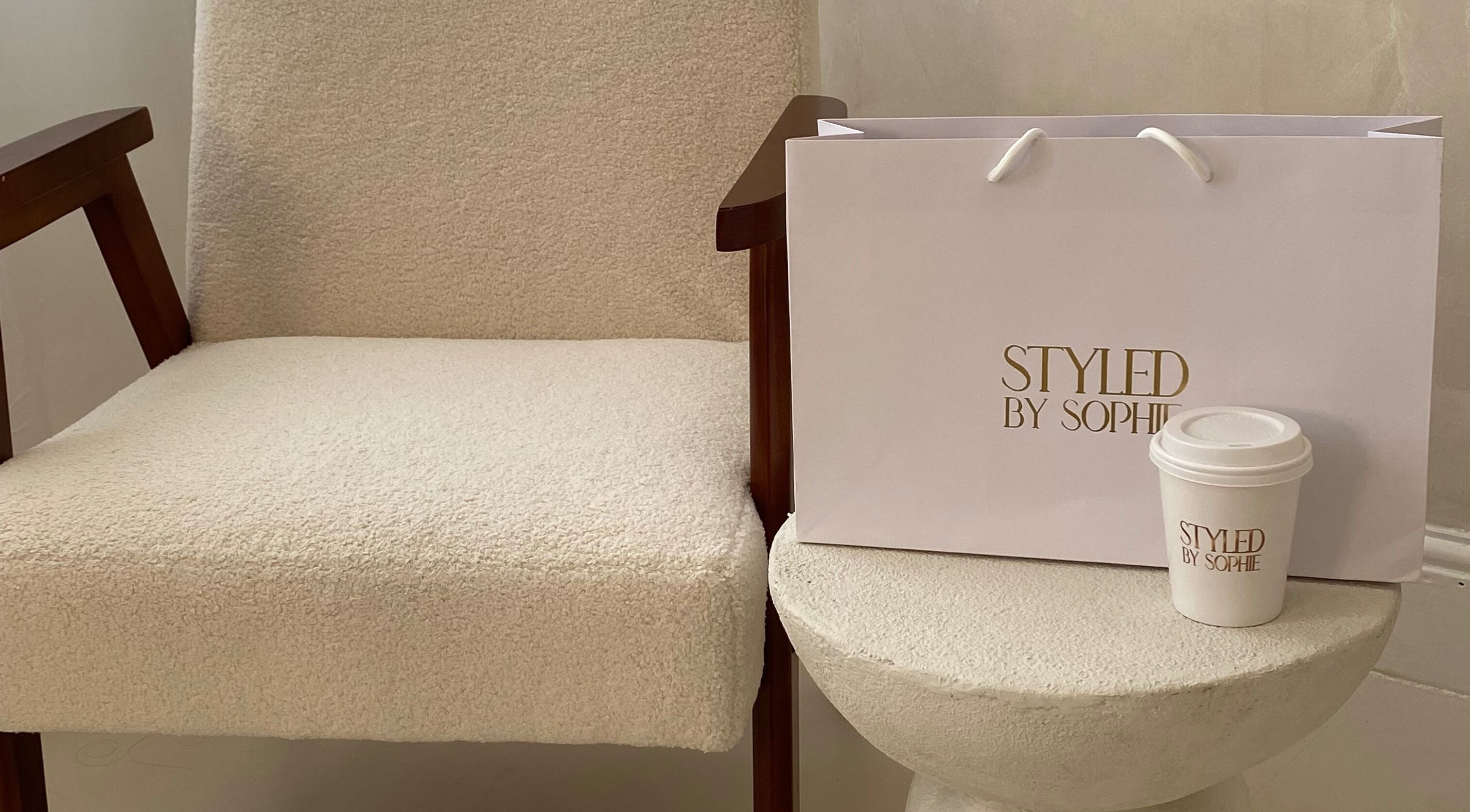 Stylish setup at Styled By Sophie, Leeds, England, GB featuring elegant chair and branded decor.