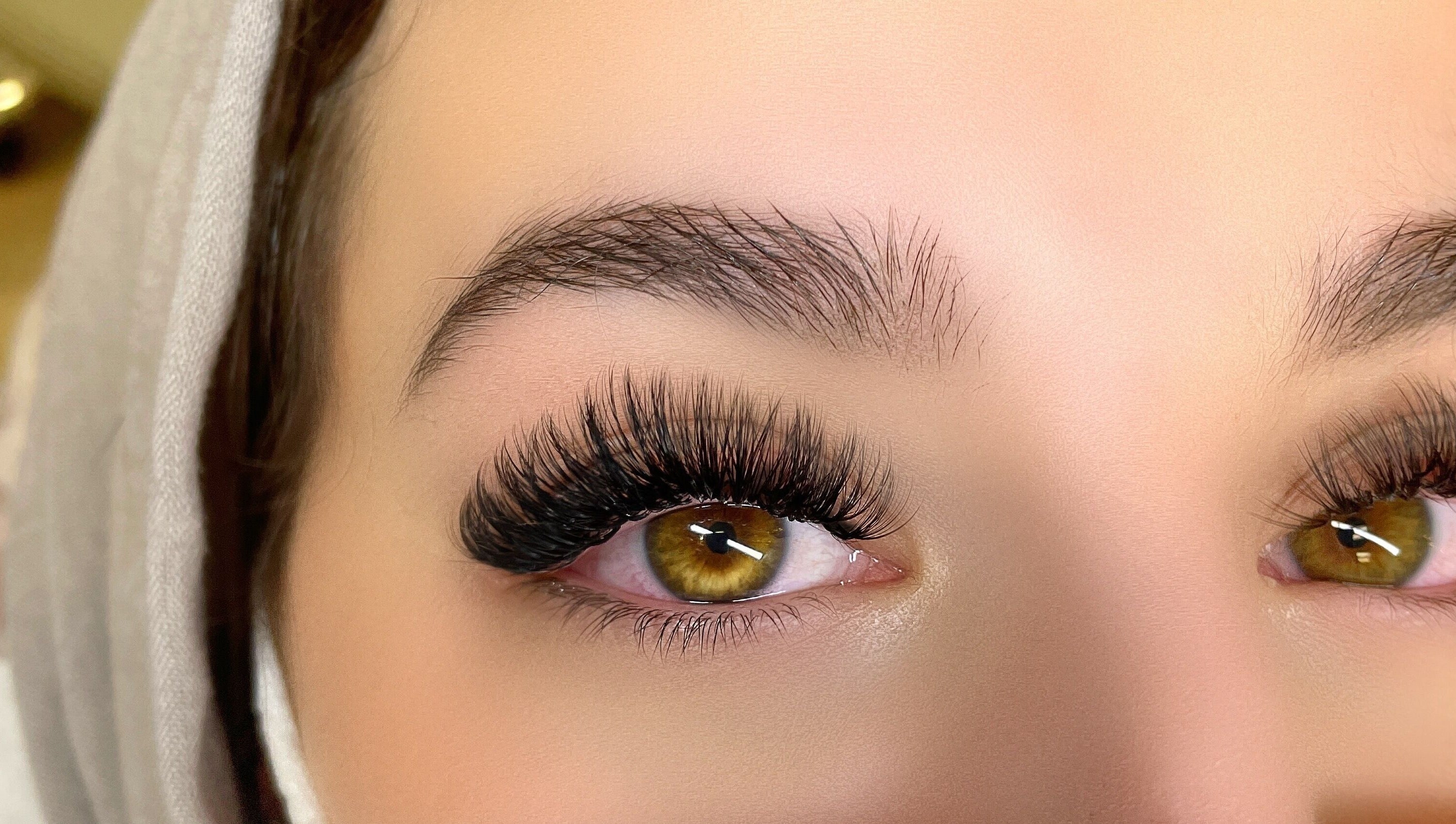 Close-up of enhanced eyelashes at Lashes Studio in San Jose, California, US.
