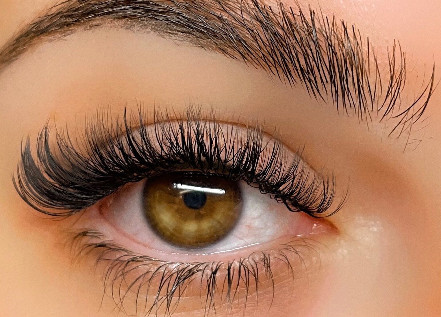 Close-up of expertly applied eyelash extensions at Lashes Studio in San Jose, California, US.