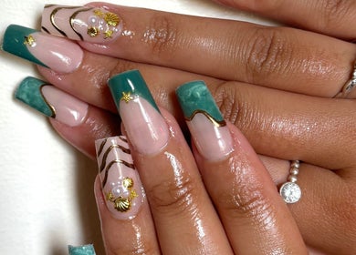 Nail art with teal and gold designs at Ctrl Nails, Tinana, Queensland, AU, highlighting elegant style.