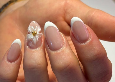 Elegant manicure with floral design at Ctrl Nails, Tinana, Queensland, AU. Perfect for a chic and stylish look.