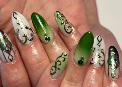Intricate emerald nail design at Ctrl Nails, Tinana, Queensland, AU. Elegant swirls and jewels adorn each nail.