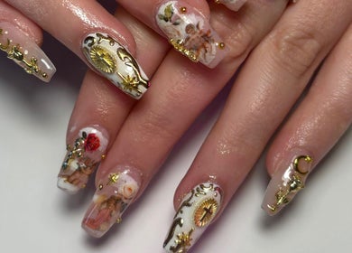Intricate nail art design at Ctrl Nails in Tinana, Queensland, AU, featuring gold accents and floral patterns.