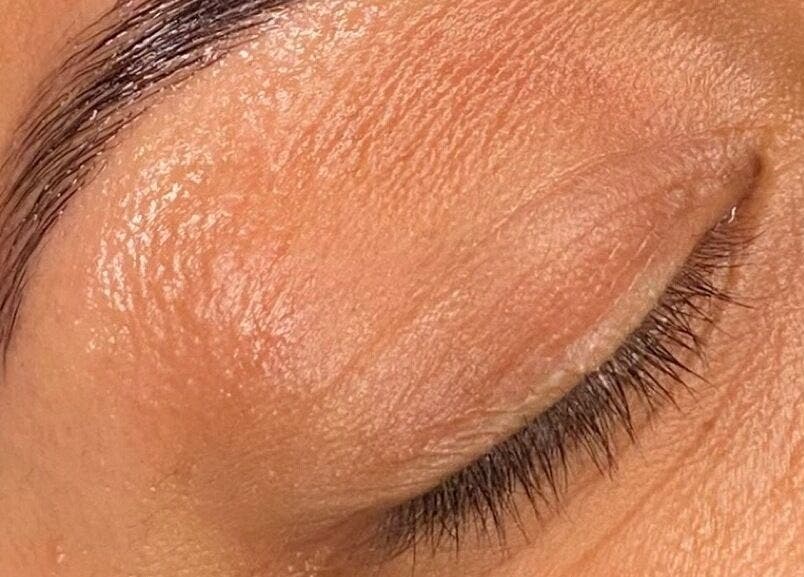 Close-up of perfectly shaped eyebrow and eyelid at Thàvma Beauty, Mulgoa, New South Wales, AU.