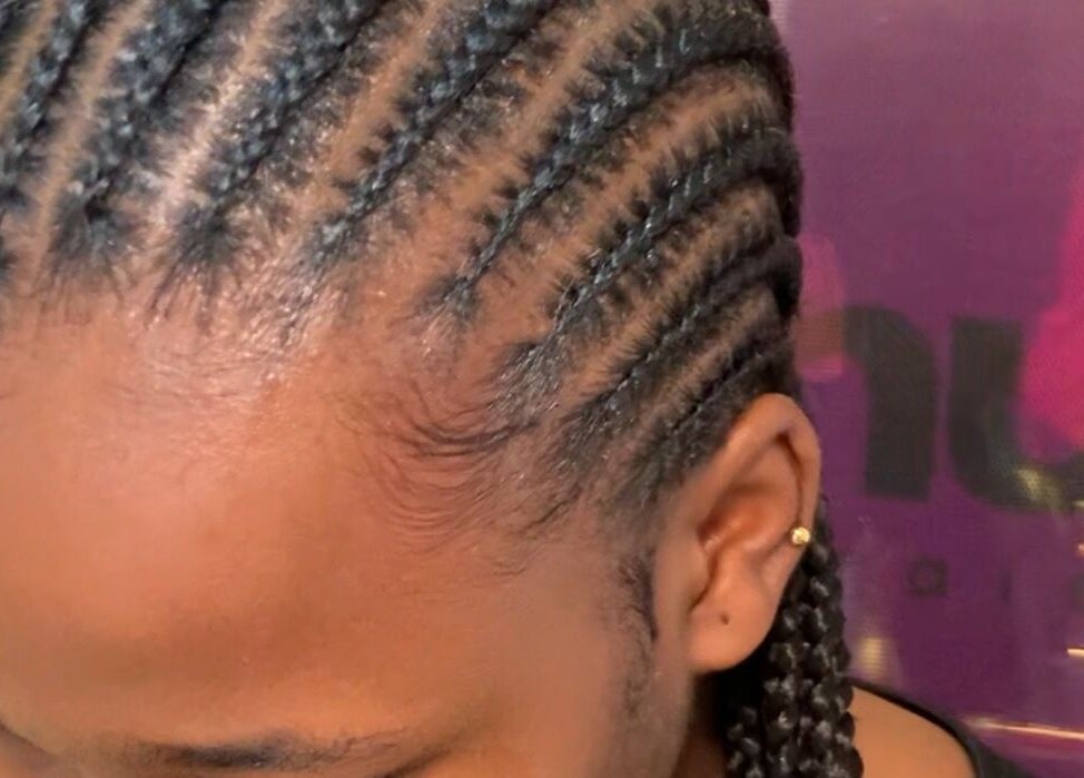 Intricate cornrow braids at Nuuri Braids n Co, Lagos, NG showcasing expert craftsmanship.