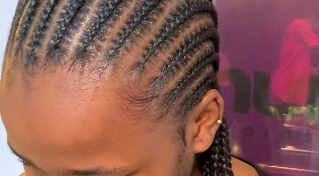 Intricate cornrow braids at Nuuri Braids n Co, Lagos, NG showcasing expert craftsmanship.
