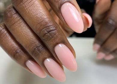 Close-up of elegant pink nails at Chic Nail Studio, Arlington, Virginia, US.
