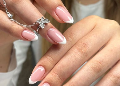 Elegant French manicure at Chic Nail Studio, Arlington, Virginia, US.