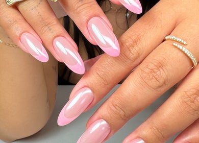 Elegant pink manicure at Chic Nail Studio, Arlington, Virginia, US, showcasing expert nail art design.