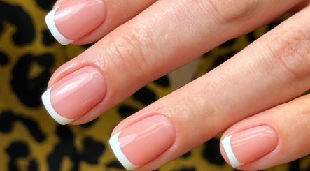 French manicure nails at Chic Nail Studio in Arlington, Virginia, US with sleek white tips and glossy finish.
