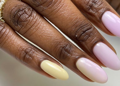 Elegant pastel nails from Chic Nail Studio, Arlington, Virginia, US, showcase trendy manicure design.