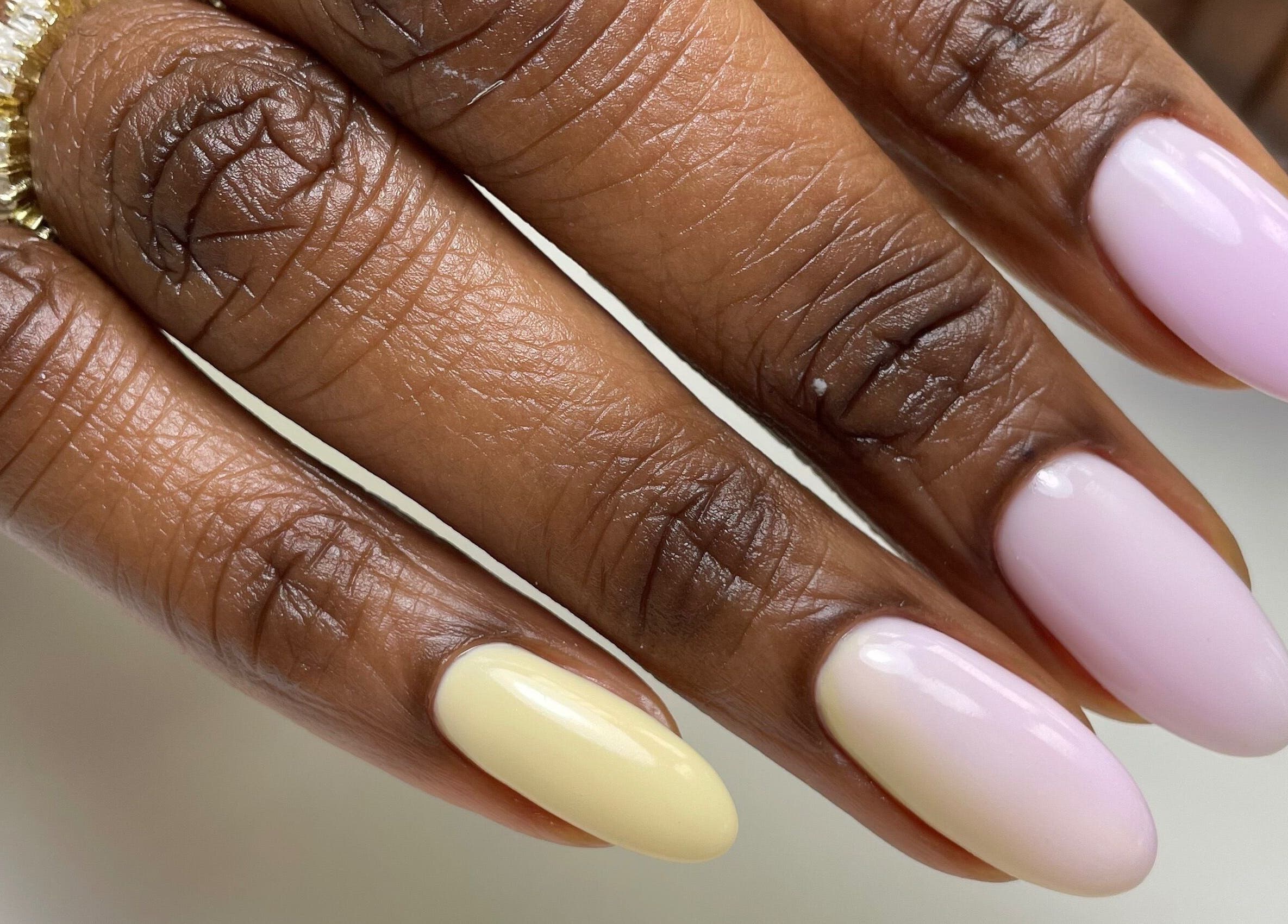 Elegant pastel nails from Chic Nail Studio, Arlington, Virginia, US, showcase trendy manicure design.
