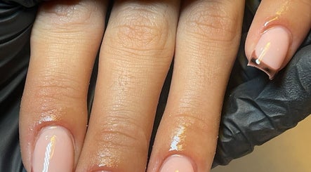 Elegant nail art at Demiejoanna Beauty, Nottingham, England, GB showcasing glossy manicure design.