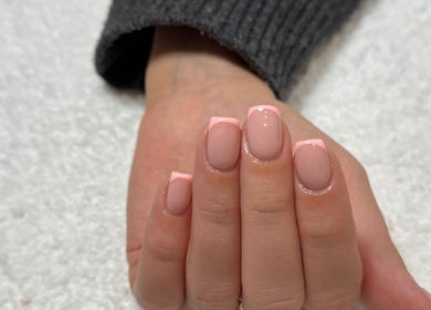 Elegant pink French manicure at Demiejoanna Beauty, Nottingham, England, GB.