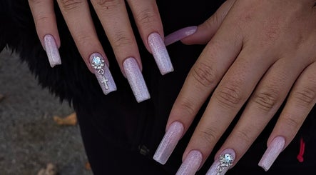 Elegant glittery nails at Sofia's Studio 444, Montréal, Québec, CA showcasing exquisite detail.