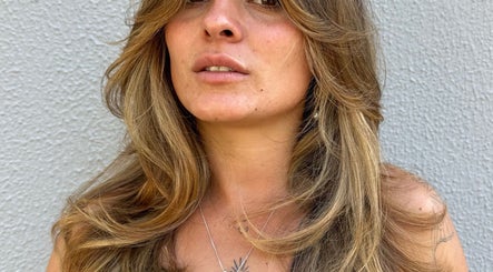 Elegant hairstyle showcased at Izzy Hanson, Melbourne, Victoria, AU. Perfectly styled waves enhance beauty and confidence.