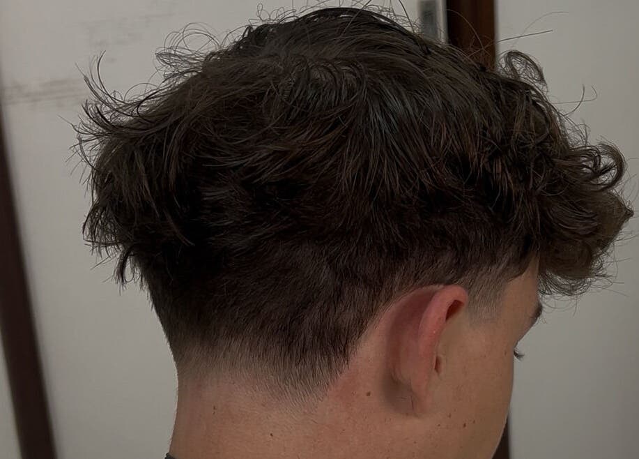 Stylish haircut at zacW in Killarney Heights, New South Wales, AU, showcasing expertly faded sides.