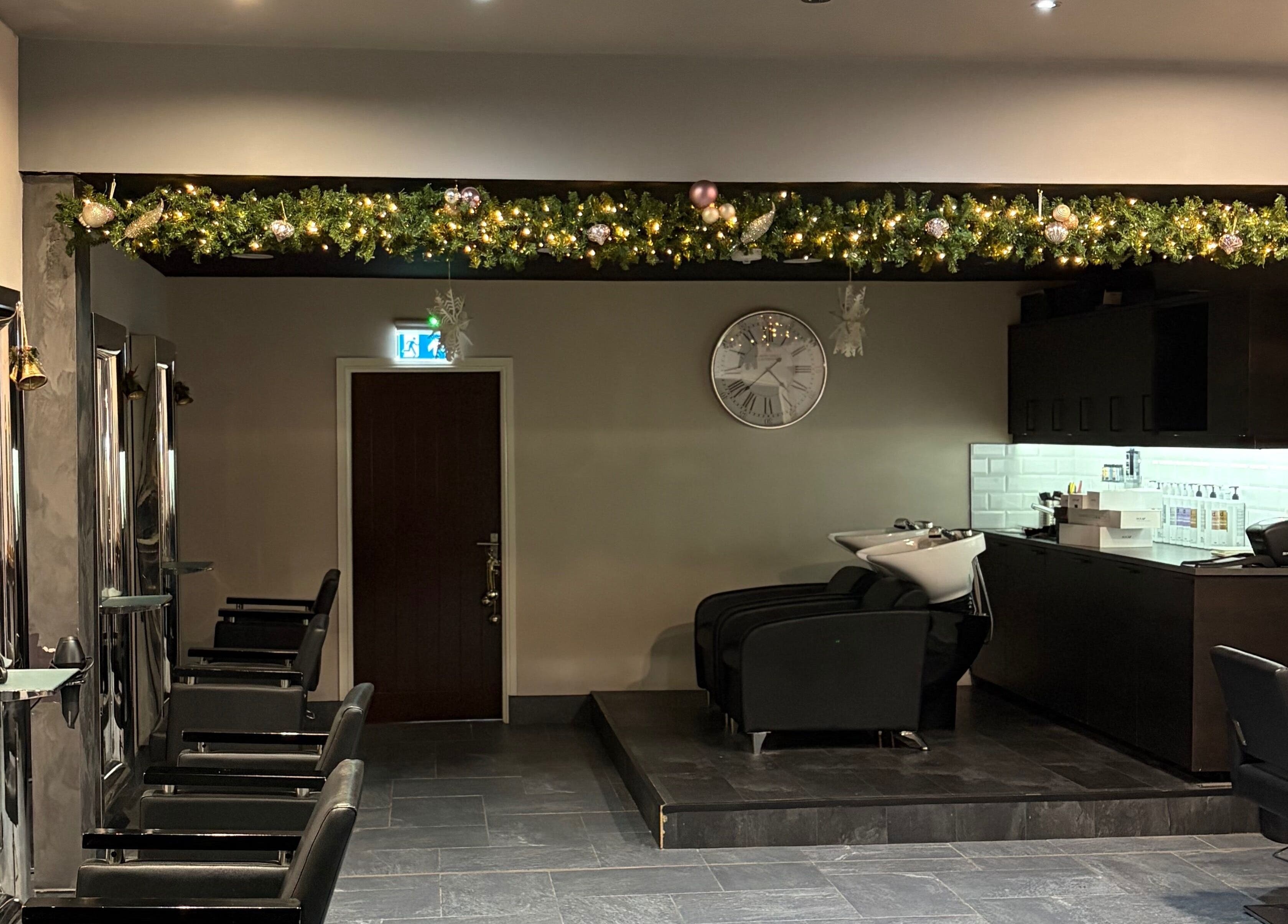 The chic seating and wash area at Anthony James Hairdressing, located in Middlesbrough, England, GB.