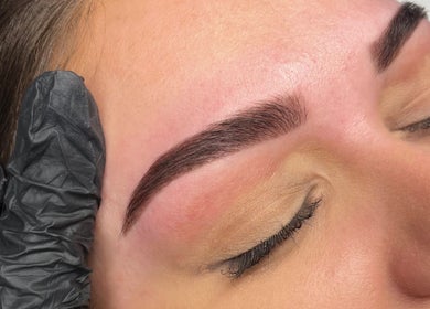 Expert eyebrow styling at Luxe Beauty, Ripon, England, GB with precise shape and definition.