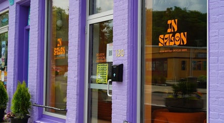 Exterior of In Salon with purple walls in Yellow Springs, Ohio, US.